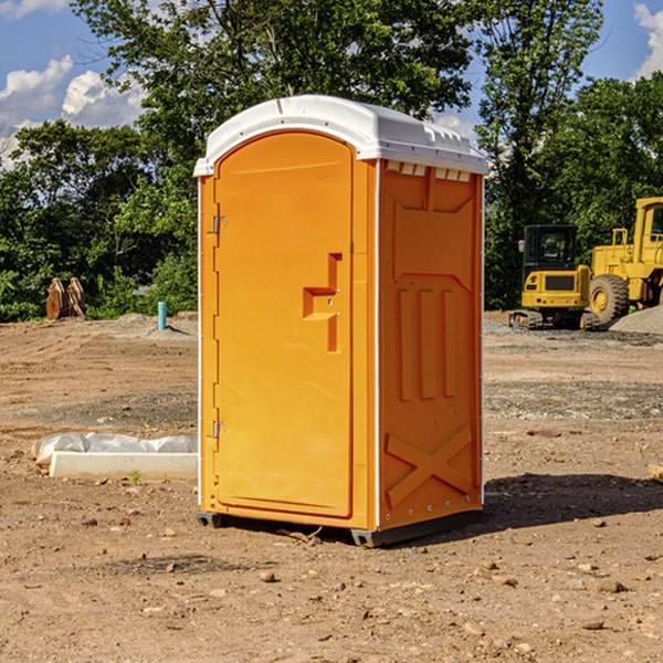 how often are the porta potties cleaned and serviced during a rental period in Biggs